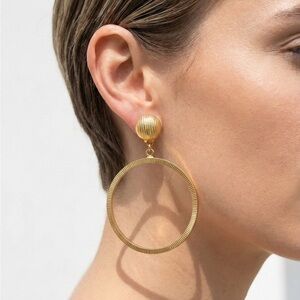 Vintage Monet medium gold door knocker hoop earrings